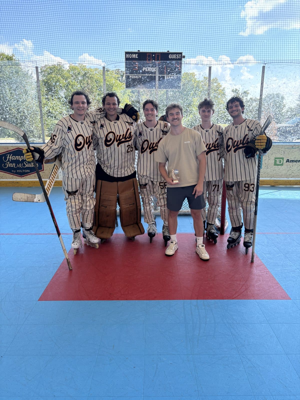 The Owls celebrating their A/B Competitive Championship win, 4–3 over Pool Boys